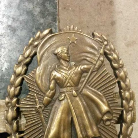 Bronze relief