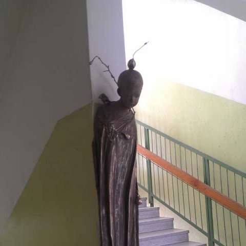 bronze sculpture of a boy