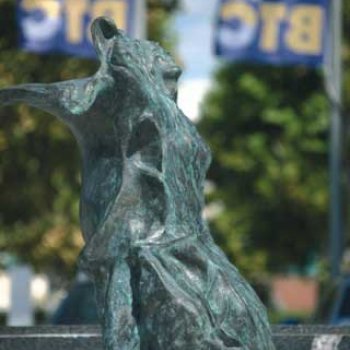 bronze statue of a woman